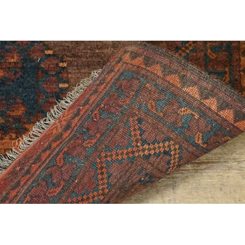 662 - A Red Ground All Over Floral bordered & Central Medallion Carpet with a Zig-Zag Border. Measuring: 1... 