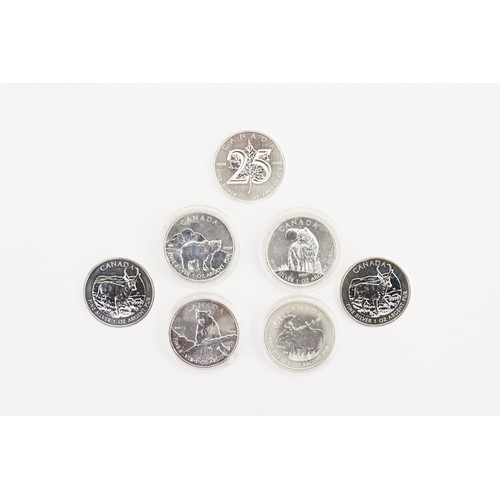 450 - A Collection of Seven 2011 - 2013 Canadian $5 Silver 1 Ounce coins. Four contained in proof cases.