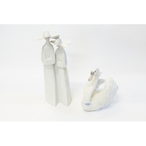 528 - A Lladro Study of Two Elongated Nuns with Habits along with a Lladro study of a Swan.