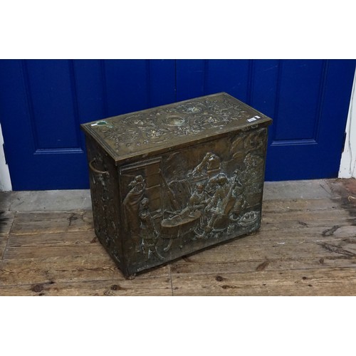 690 - A Dutch Brass embossed Log Box with Decoration & Side Handles. Measuring: 65cmsa across x 33cms deep... 