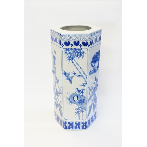 1042 - A Chinese Blue & White Umbrella Stand decorated with Landscapes.