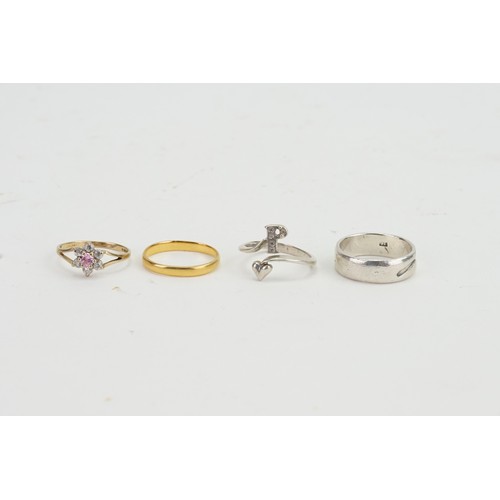 226 - A 22ct Gold Wedding Ring. Weighing: 2 Grams. A 9ct Gold Ring. Weighing: 1.4 grams. Along with a coll... 