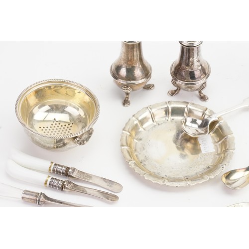 83 - Two Silver Pepperette's, a Fluted Shell shaped dish, a Silver Wine Funnel Top & various Silver Plate... 