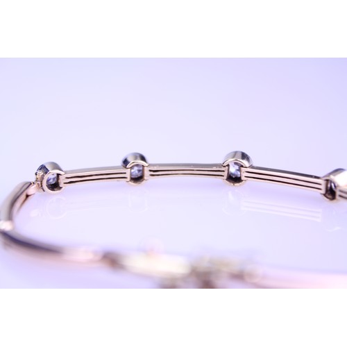 188 - A 15ct Gold bracelet converted from a watch strap, set with 5 paste stones. Total weight 9.3 grams. ... 