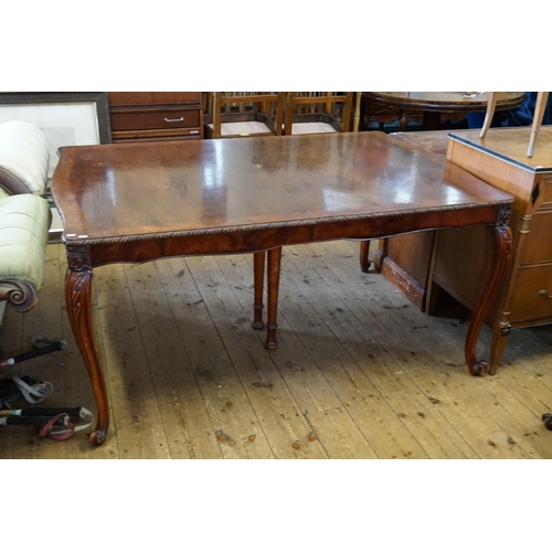 460 - A Georgian Design Cuban Mahogany Veneered Drawer Leaf Table with elongated Spanish Foot resting on S... 