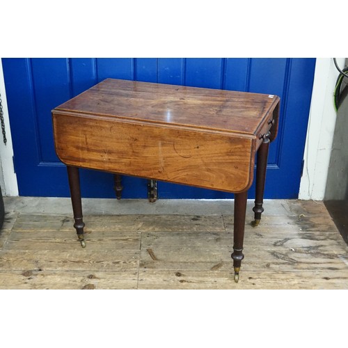 468 - A Victorian Mahogany Drop-Flap Pembroke Table resting on turned legs & a Fitted Drawer. Measuring: 9... 