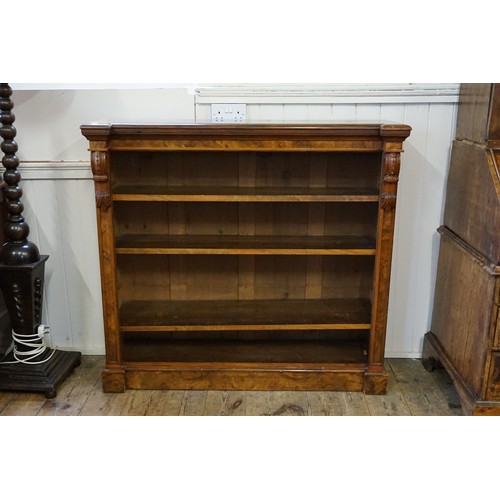 494 - A Victorian Walnut veneered Line inlaid Bookcase fitted with shelves & a Carved Scrolled Column. Mea... 