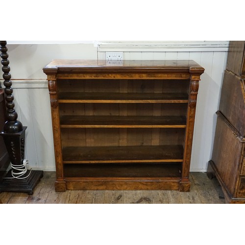 494 - A Victorian Walnut veneered Line inlaid Bookcase fitted with shelves & a Carved Scrolled Column. Mea... 