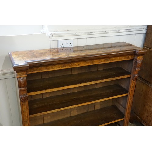 494 - A Victorian Walnut veneered Line inlaid Bookcase fitted with shelves & a Carved Scrolled Column. Mea... 