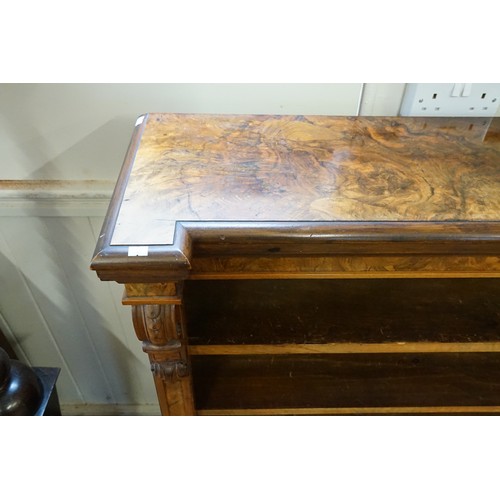 494 - A Victorian Walnut veneered Line inlaid Bookcase fitted with shelves & a Carved Scrolled Column. Mea... 