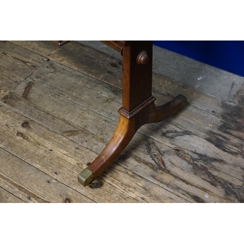 499 - A Victorian design Long Single Drawer Side Table resting on Chamfered Splayed Legs, Brass Caps & Tur... 