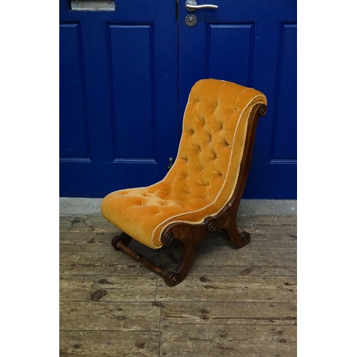 500 - A Late 19th Century Nursing Chair upholstered in Button Back Gold Dralon with metal mounts & turned ... 