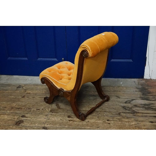 500 - A Late 19th Century Nursing Chair upholstered in Button Back Gold Dralon with metal mounts & turned ... 