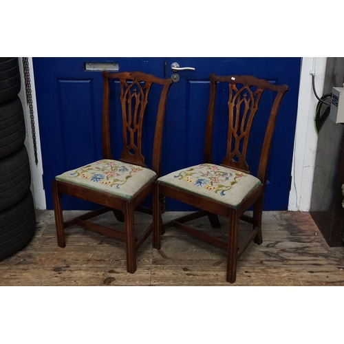 509 - Two Hepplewhite Pierced back Mahogany Framed Dining Chairs resting on Reeded Front Legs.