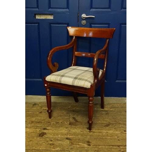 516 - A Regency Swan Necked Dining Chair with a curved back resting on shaped turned feet.