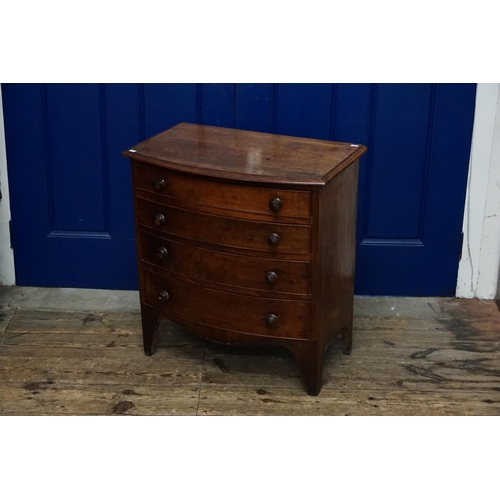 519 - A Mahogany Bow Fronted Chest of Four Graduated Drawers with turn wood handles & resting on bracket f... 