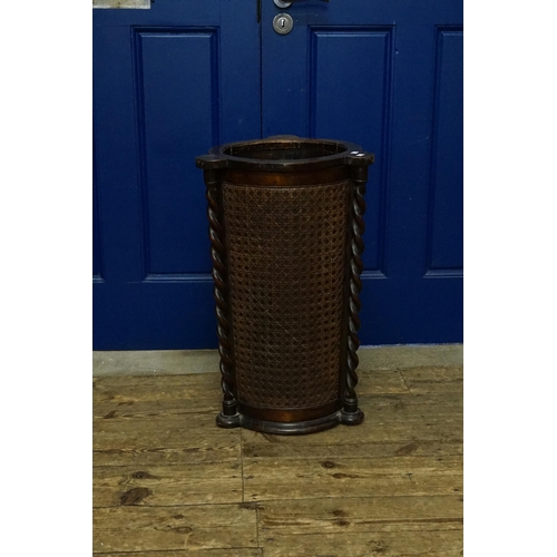 522 - An Edwardian Bergere & Barley Twist Umbrella Stand or circular Form. Measuring: 64cms High.