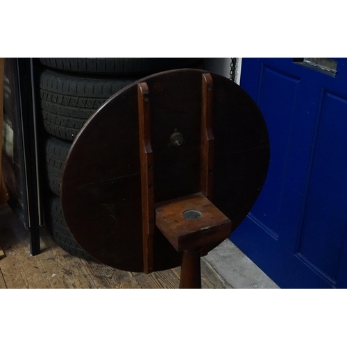 526 - An Antique Circular Topped Tripod Wine Table with a Flip-Top & resting on Pad Feet. Measuring: 83cms... 