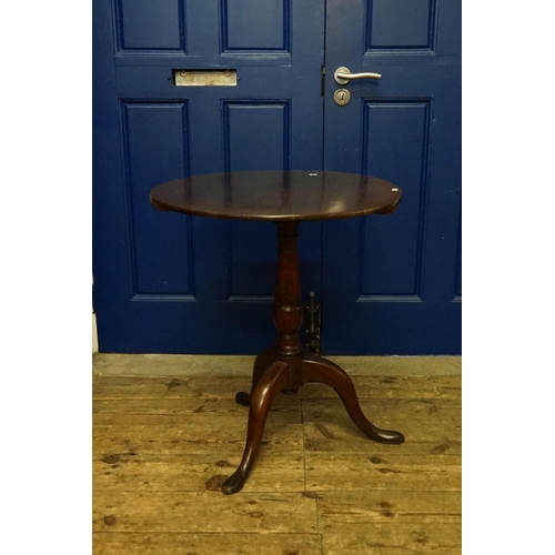 526 - An Antique Circular Topped Tripod Wine Table with a Flip-Top & resting on Pad Feet. Measuring: 83cms... 