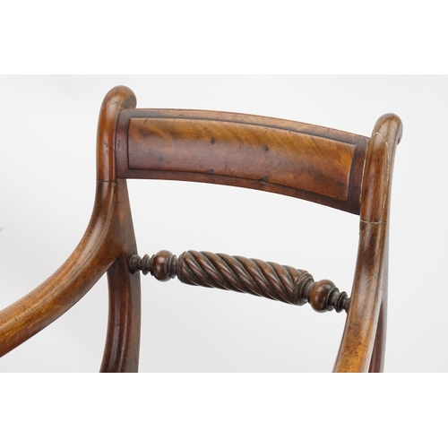 531 - A Regency Mahogany Child's Chair with a Rope Twist Back, Swan Neck Arms, alternating Foot Step & a f... 