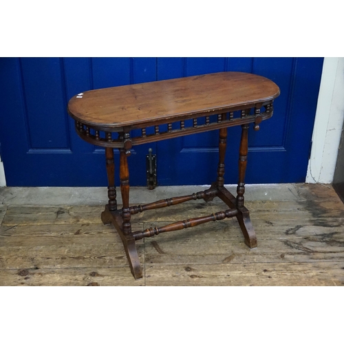 537 - A Late 19th Century Galleried Serving Table resting on swept out legs & turned cross stretchers. Mea... 