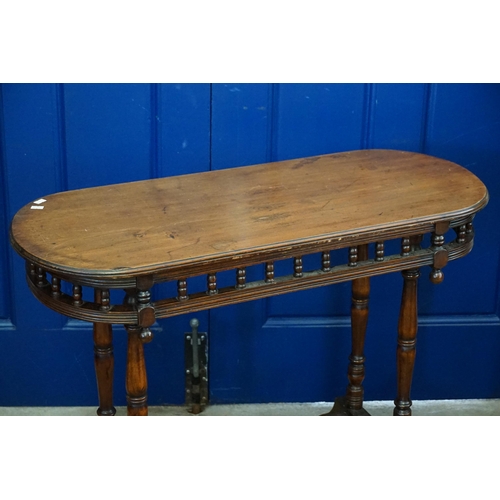 537 - A Late 19th Century Galleried Serving Table resting on swept out legs & turned cross stretchers. Mea... 