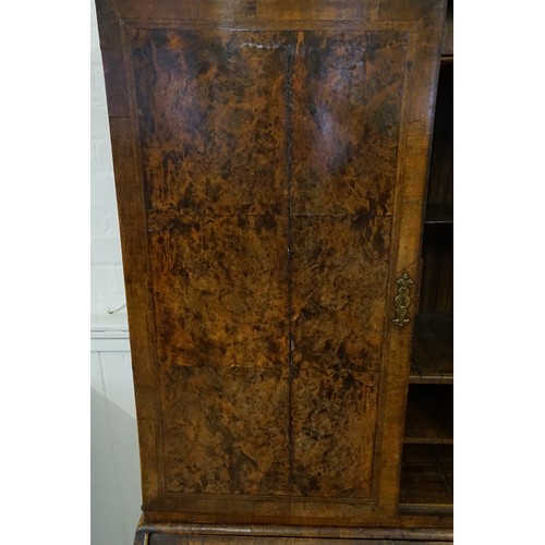 548 - An early 18th Century walnut feather banded and stained field maple bureau bookcase. Email from Bonh... 