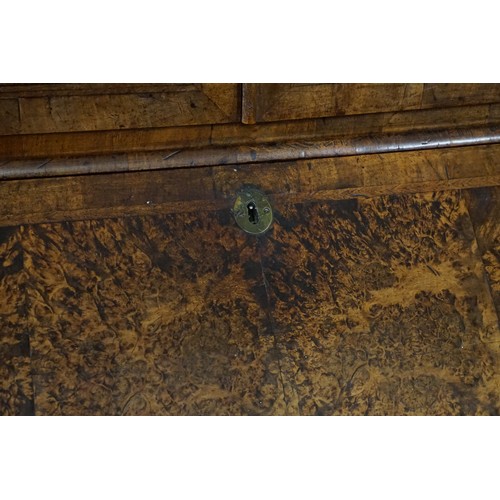 548 - An early 18th Century walnut feather banded and stained field maple bureau bookcase. Email from Bonh... 