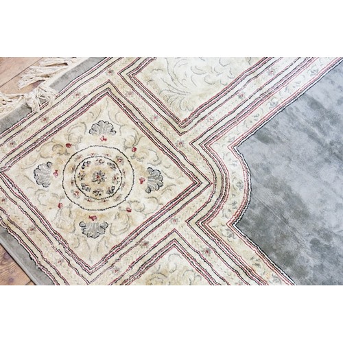 551 - A Beige Ground Floral Gold Patterned Line and Floral Twin Bordered Kashan Part Silk Carpet with Meda... 