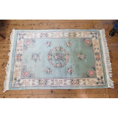 552 - A Blue Ground Bordered and Floral, Central Medallion India Carpet with Bound Edge. Measuring: