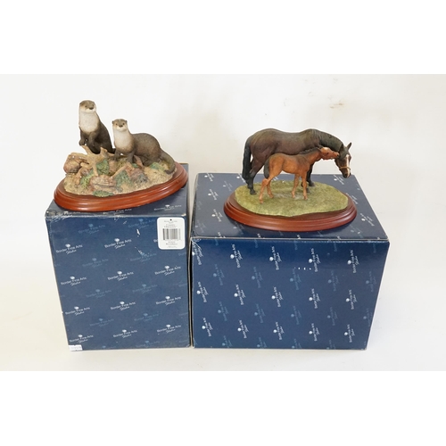 403 - A Border Fine Arts study of River Otters (A1018) & a similar Mare & Foals (A0147). Both Boxed.