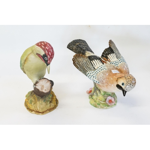 411 - A Beswick study of a Jay No: 1219 & a Beswick study in Buff Glaze of a Wood Pecker No: 1218.