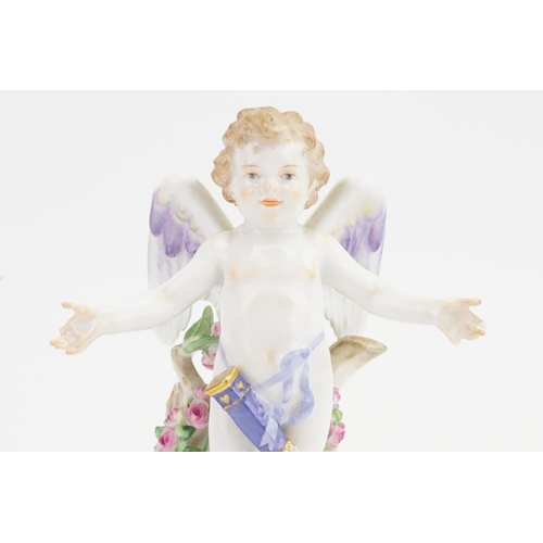 421 - A Meissen Floral & Garland encrusted Study of an Angle with Blue Wings. Model No: 148 NIGH. (Three F... 