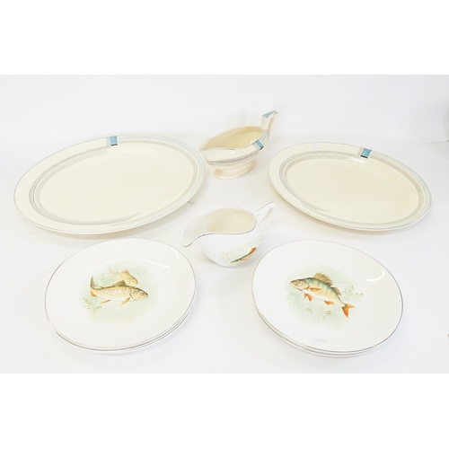 339 - A Set of 6 Wedgwood Plates & a Gravy Boat depicting Fish along with Two Large Oval Plates & a Gravy ... 