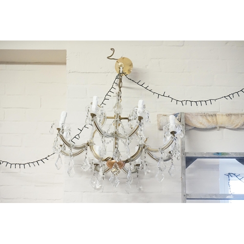 563 - An 8 Branch Glass Chandelier.