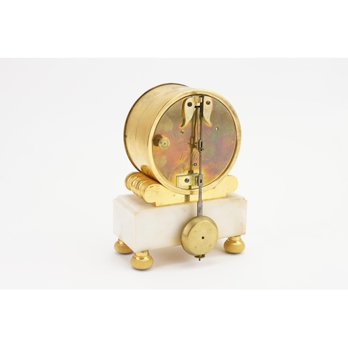 244 - A Circa 1820 Regency ormolu and white marble mantel clock, with an eight day chain fusee movement, t... 