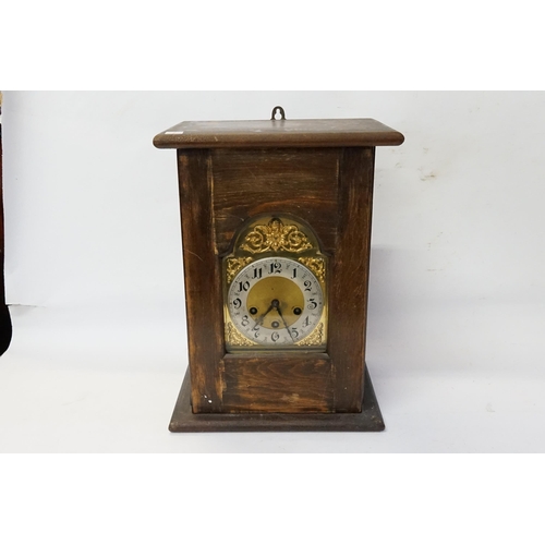 247 - A Late 19th Century stained as beech Bracket Clock containing a German striking movement with nickel... 