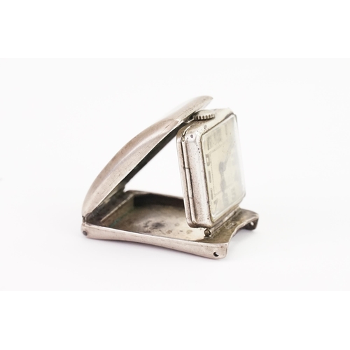 309 - A Circa 1920 Silver Fold-Out Travel Watch with various markings from Brevet Texa 0.935 A*M, etc. Thi... 