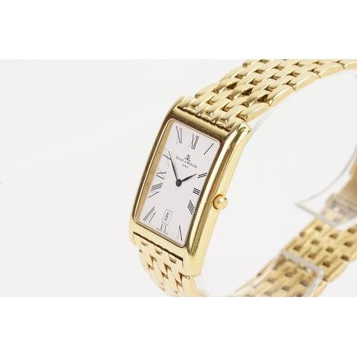 198 - A 18ct Baume & Mercier Hampton 24, Ref. MV045144 tank wristwatch, with a 18ct Gold strap and white d... 