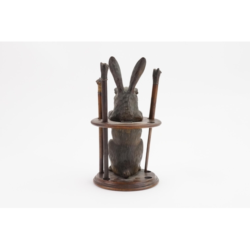 599 - An Unusual Victorian Inkwell designed as a Rabbit with Three out of Four Rabbit Pens in a coloured e... 