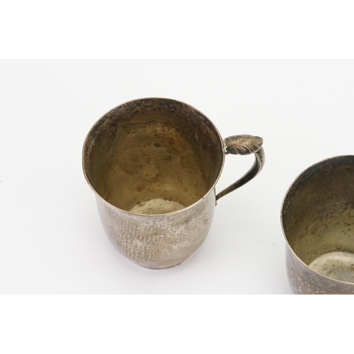 10 - A Pair of Danish Silver (925) Cactus Handled Toasting Mugs, designed by Harald Neilsen. Weighing: 20... 