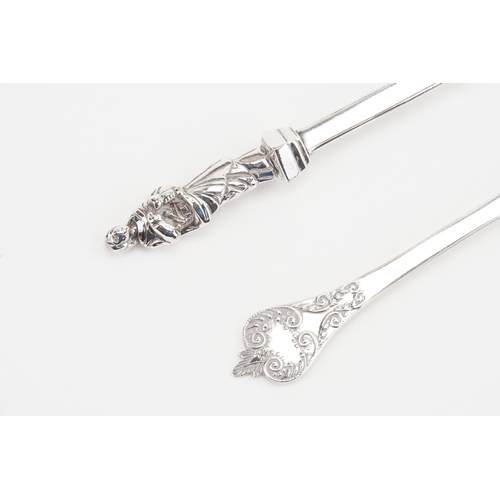 20 - A Victorian Silver Apostle Spoon/Fruit Spoon and a Reproduction Charles II Lace Back Jam Spoon.