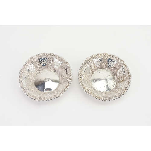 25 - A Pair of Silver Die Stamped Bon Bon Dishes. Weighing: 72 grams.