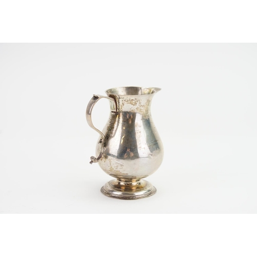 41 - A Sparrow Beaked Silver Cream Jug with marks on base. Weighing: 62 grams.