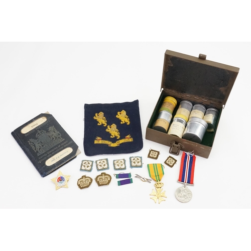 305 - A Collection of World War II Items to include a Metal Tin marked 