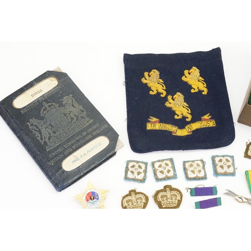 305 - A Collection of World War II Items to include a Metal Tin marked 