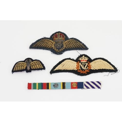 306 - Three World War II Lapel Badges to include a Parachute Badge, a New Zealand Badge & an RAF Badge alo... 