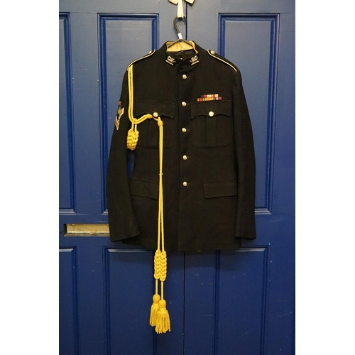 285 - A Navy Blue & White Trimmed Mess Jacket with Yellow Rope Sash, Lyre & Oakleaf Crest along with Match... 