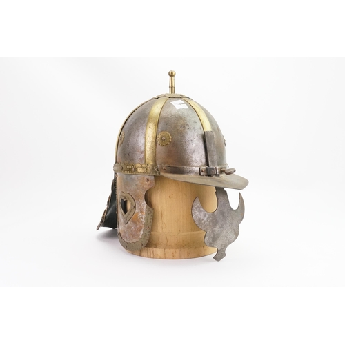 286 - An Iron & Brass Lobster Pot Helmet for the Polish Hussars with a Wooden Base.