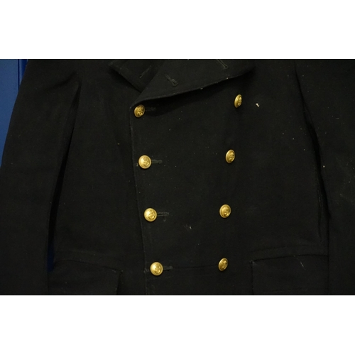 293 - A Naval issue Wide Lapelled Coat with Brass Buttons owned by 